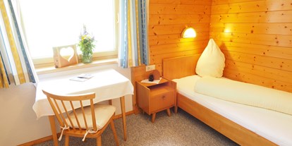 Pensionen - Wanderweg - Montafon - Einzelzimmer mit Ausblick zum See - Haus Zeinissee