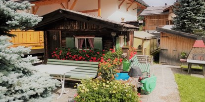 Pensionen - Frühstück: Frühstücksbuffet - Corvara / Alta Badia - Garten im Sommer - Garni Gabrieli