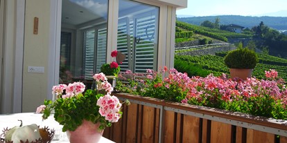 Pensionen - Art der Pension: Frühstückspension - Italien - überdachte Terrasse und Wintergarten - Haus Karin ***