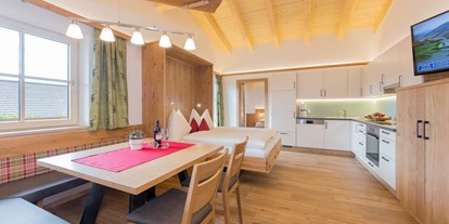 Pensionen - Art der Pension: Urlaub am Bauernhof - Salzburg - Appartement Panoramablick mit zusätzlichem Schrankbett für 2 Personen in der Wohnküche - Schönberghof
