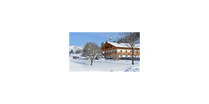 Pensionen - Garten - St. Johann in Tirol - Hausfoto Winter - Strasserhof Söll