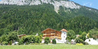 Pensionen - Garten - Fieberbrunn - Das Landhaus Ager befindet sich direkt neben dem Hotel AlpenSchlössl auf einer kleinen Hochebene 2,5 km vom Ortszentrum Söll am Wilden Kaiser entfernt. - Landhaus Ager