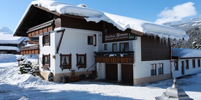 Pensionen - Balkon - Damüls - Hausansicht Winter - Landhaus Bromm