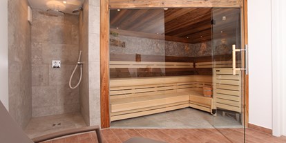 Pensionen - Sauna - Krumbach (Krumbach) - BIO Felsensauna mit modernem Duschbereich - Landhaus Bromm