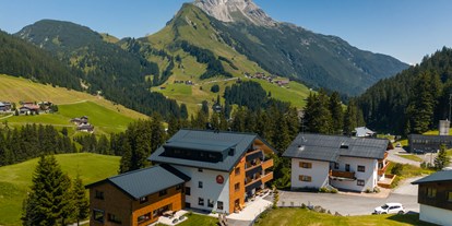 Pensionen - Skiverleih - Schröcken - Außenansicht Alpin - Studios & Suites - Alpin - Studios & Suites