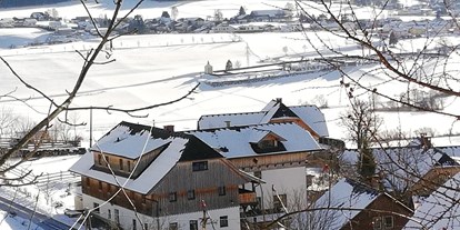 Pensionen - Terrasse - Wörschach - Haus im Winter - Ortnerhof Ennstal