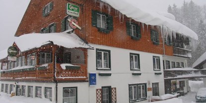 Pensionen - Art der Pension: Gasthaus mit Zimmervermietung - Aich (Aich) - Der Gasthof im Winter - Gasthof Staudnwirt