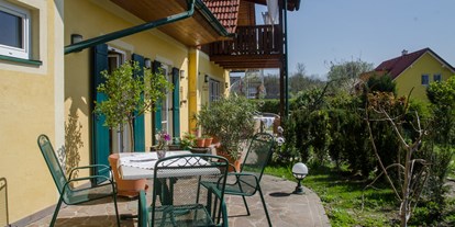 Pensionen - weitere Verpflegungsmöglichkeiten: Abendessen - Heimschuh - Terrasse - Fremdenzimmer und Restaurant Herberts Stubn