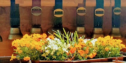 Pensionen - Garten - Bern - Glockenspiel aus Familientradition - Chalet-Gafri BnB - Frühstückspension mit Top-Service auch jetzt in dieser Zeit.