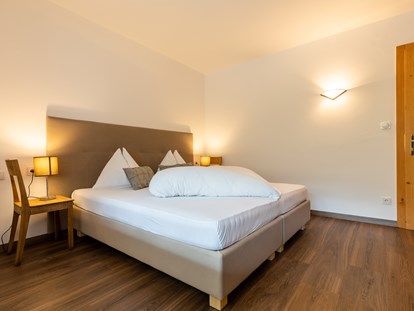 Pensionen - WLAN - Trentino-Südtirol - Schlafzimmer 1 Gardensuite Apartment  LATEMAR - Haus Christian 
