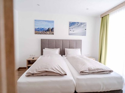 Pensionen - Umgebungsschwerpunkt: am Land - Schlafzimmer im Hohe Burg Appartement - Alpengasthof Hohe Burg