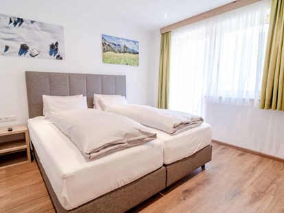 Pensionen - Österreich - Schlafzimmer im Panorama-Appartement - Alpengasthof Hohe Burg