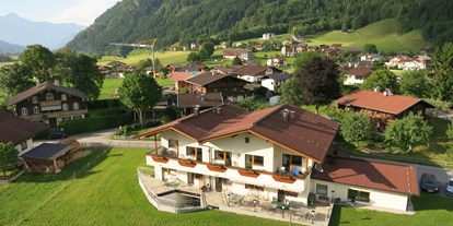 Pensionen - Restaurant - Reith im Alpbachtal - unser Ferienhaus das im Jahr 2011 erstmals Gäste empfangen hat, aus der Vogelperspektive - Ferienhaus Zillertal