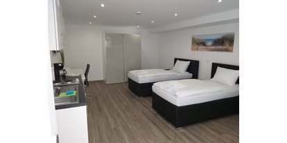 Pensionen - Castell - Doppelzimmer mit Einbauküche UG - Gästehaus Estenfeld