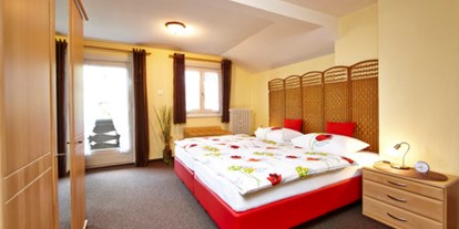 Pensionen - Fahrradverleih - Oberbayern - Junior-Suite Zugspitze - Schlafzimmer - Gästehaus im Winkel
