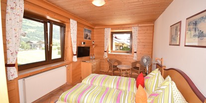 Pensionen - Pinzgau - Familien Appartament mit zwei getrente Schlafzimmern für 4 Personen - 1. Schlafzimmer - Golf & Ski Chalet****